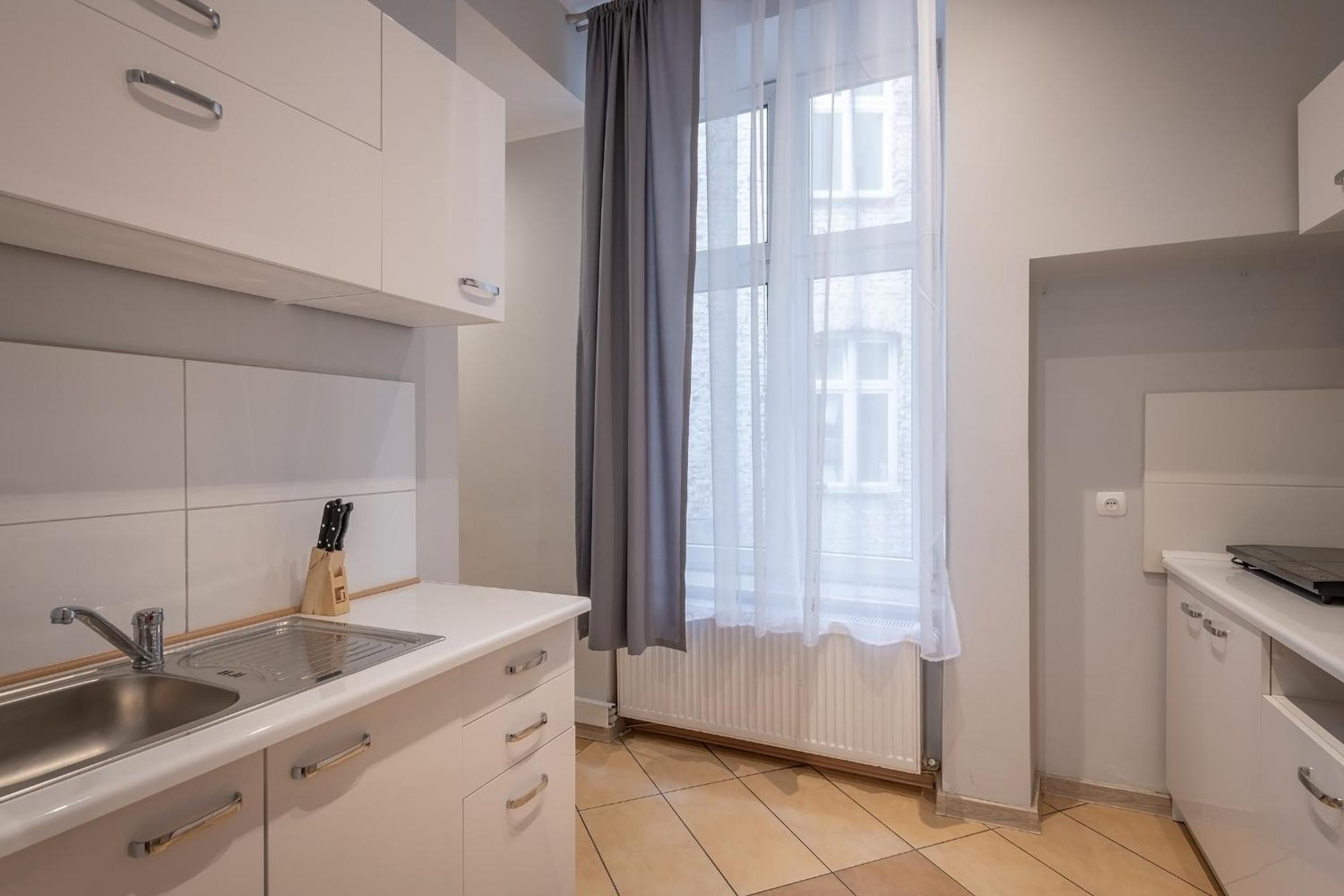 Queen Apartments
