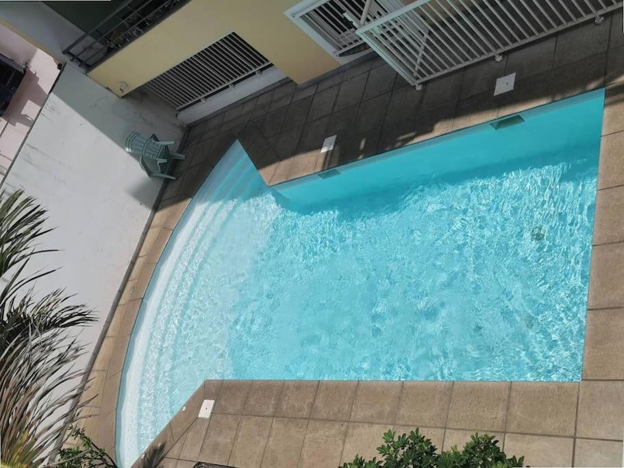 JADE - Appt 2 chb - 4 personnes - à 200 m du lagon de Saint-Pierre - Résidence avec belle piscine et parking privé - sur le front de mer et à 2 pas du cent