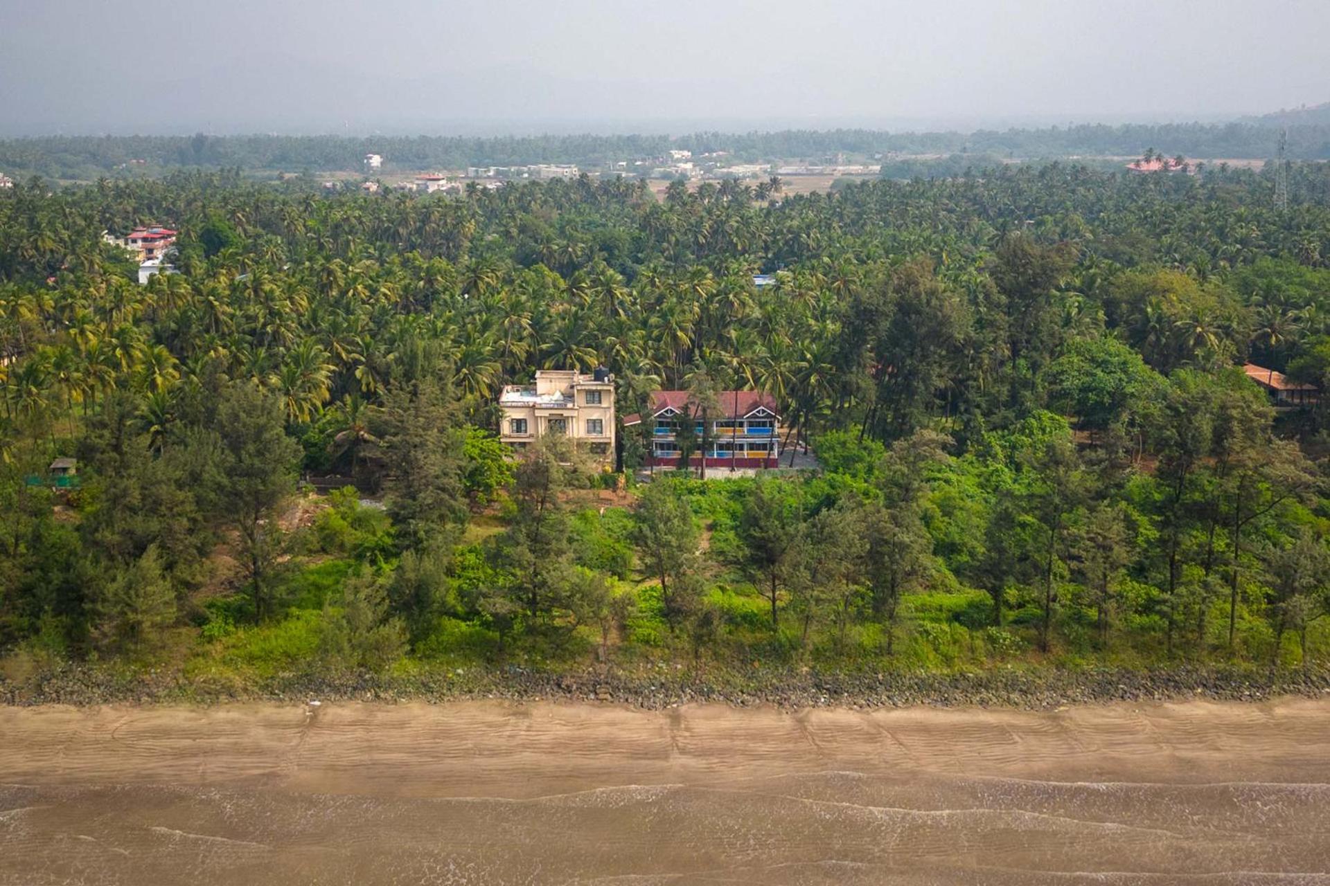 Serene Seaside Chalet by StayVista - Wooden retreat near Nagaon Beach