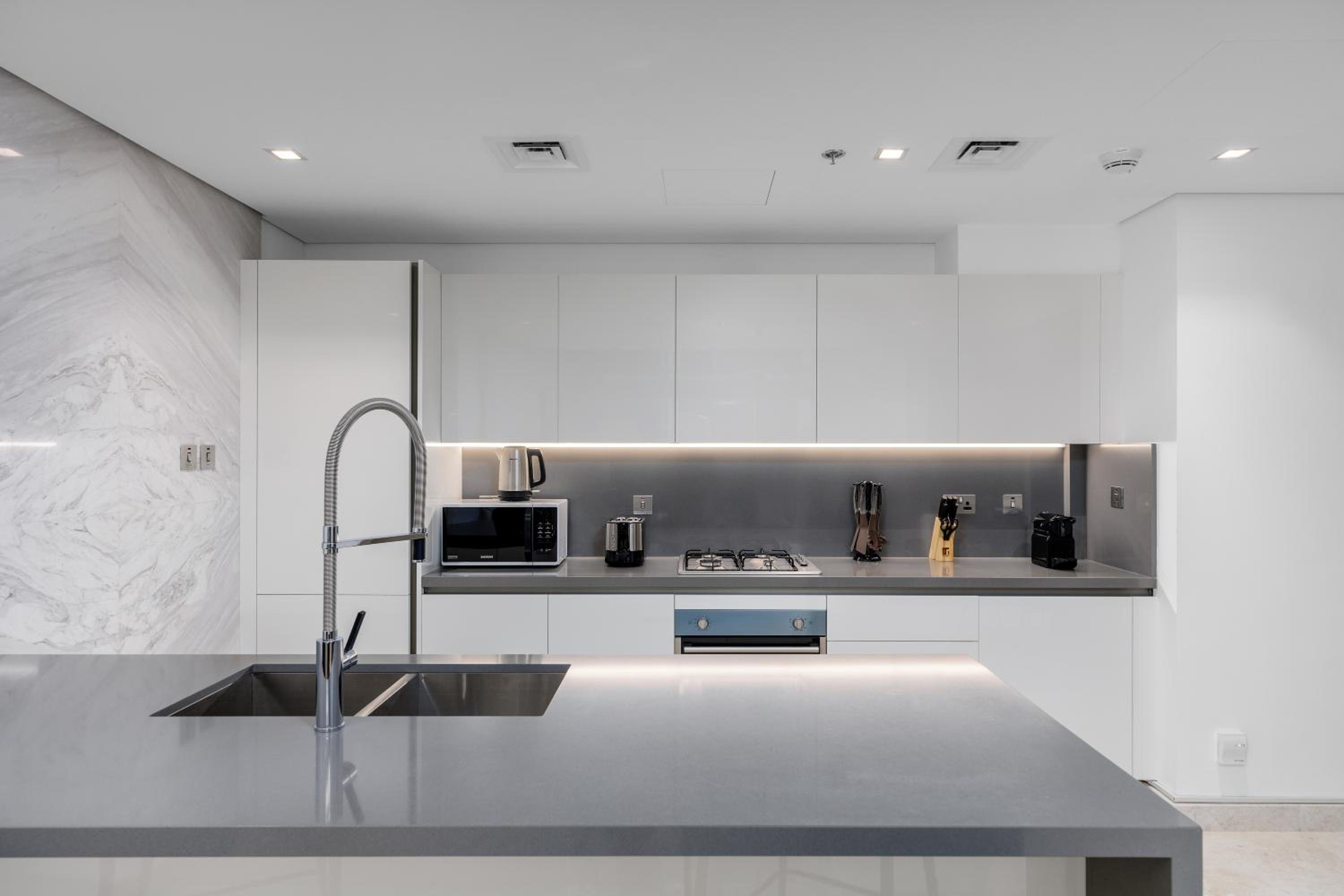 Maison Privee - Exquisite Duplex with Private Patio & Loft Living