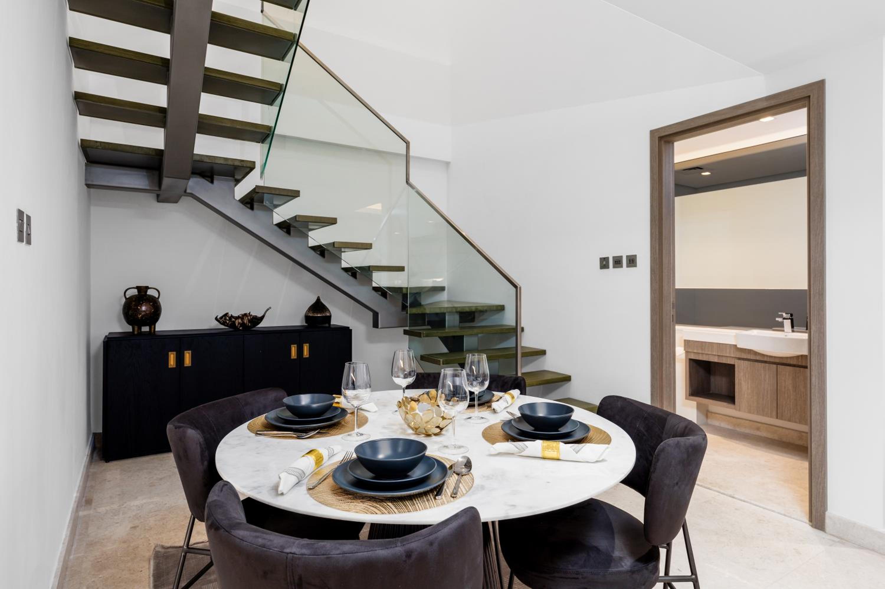 Maison Privee - Exquisite Duplex with Private Patio & Loft Living