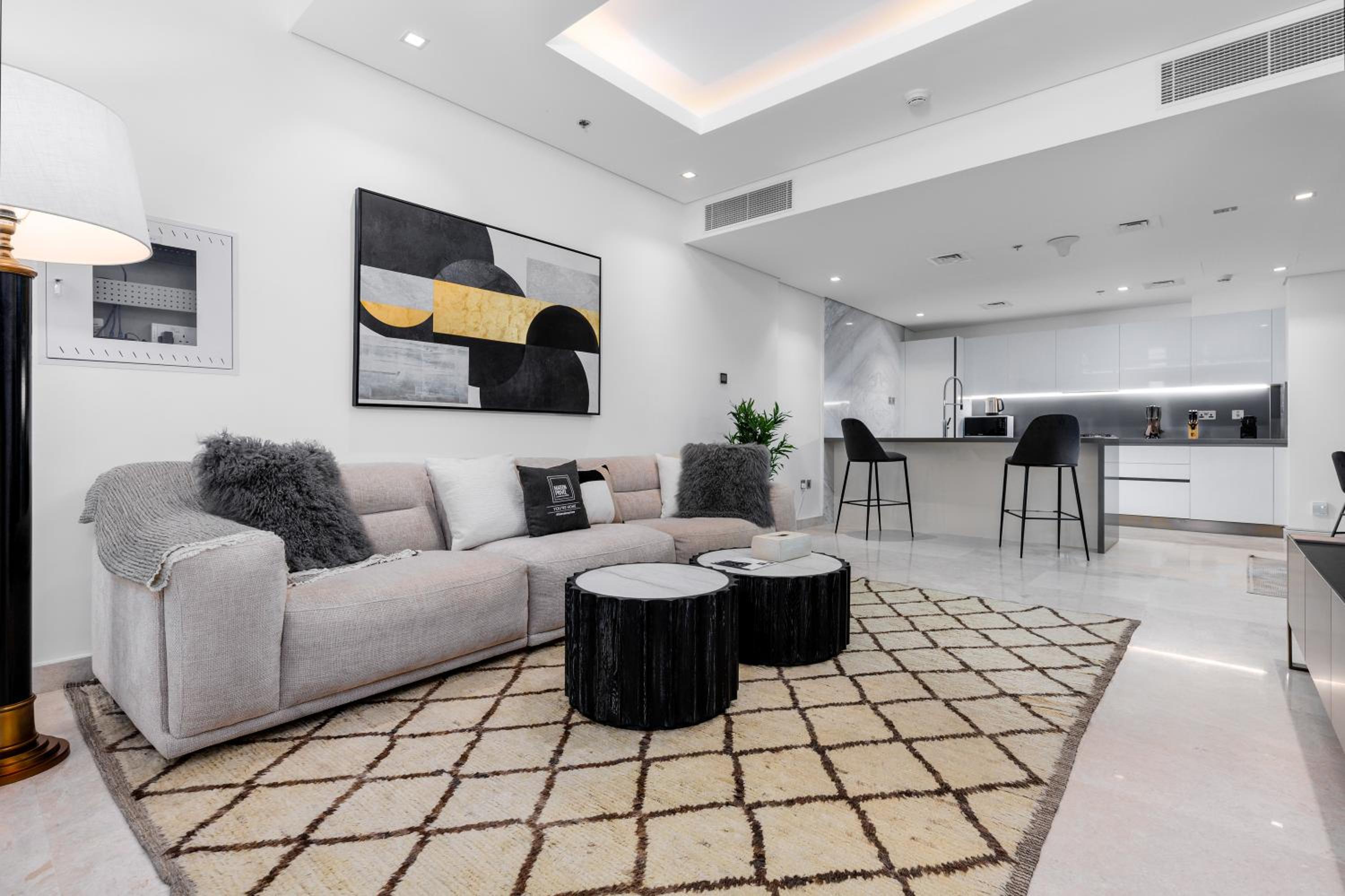 Maison Privee - Exquisite Duplex with Private Patio & Loft Living