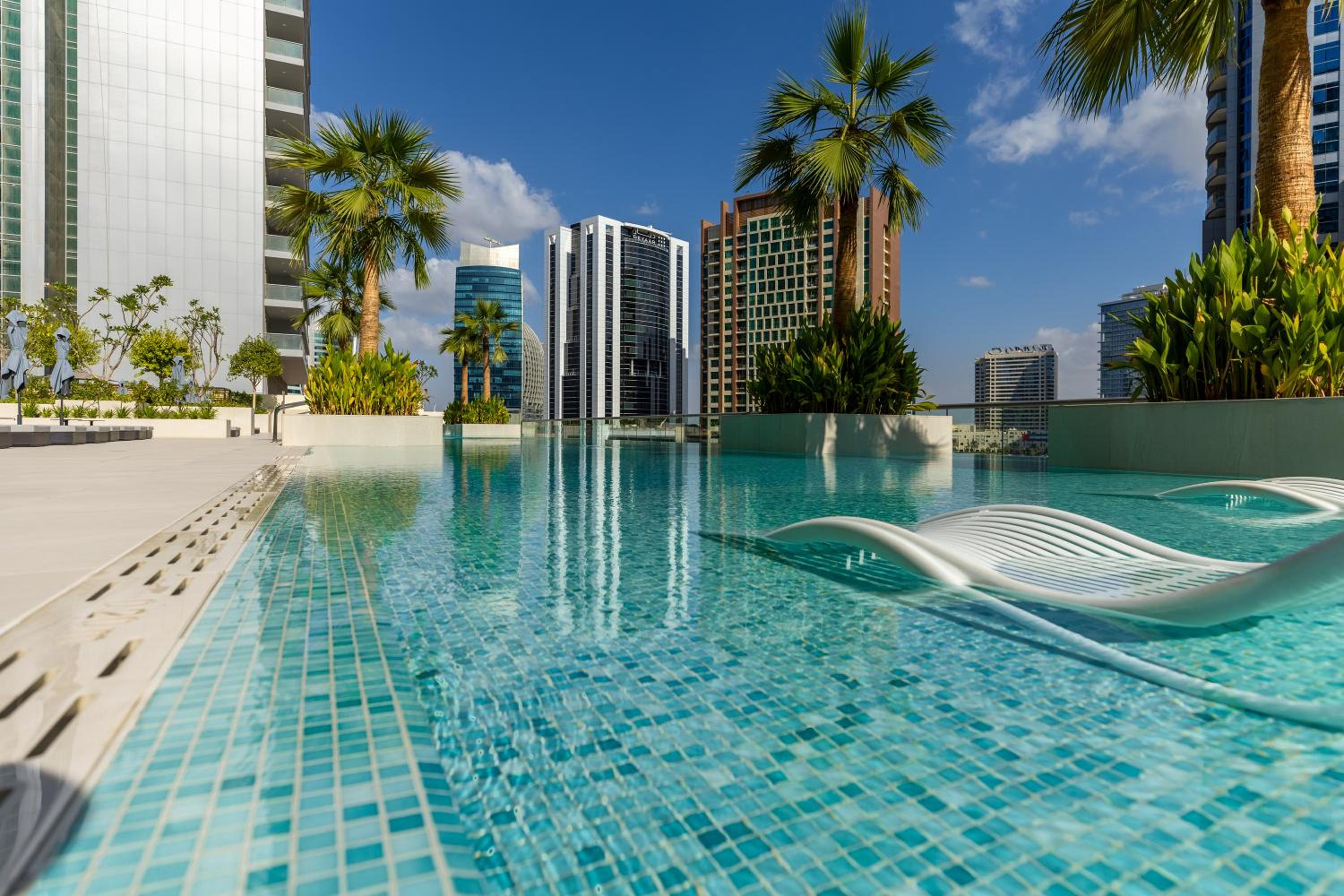Maison Privee - Exquisite Duplex with Private Patio & Loft Living