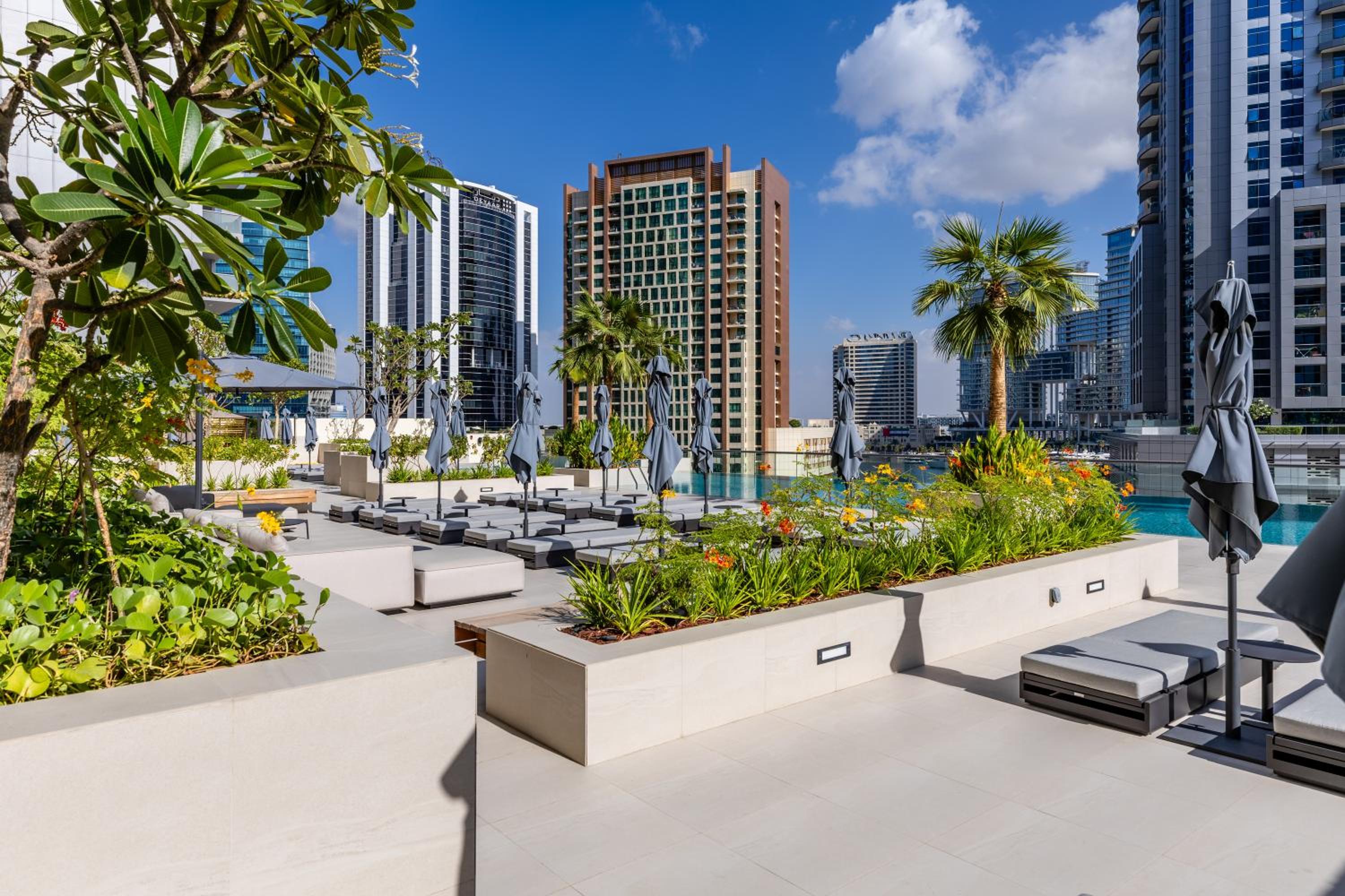 Maison Privee - Exquisite Duplex with Private Patio & Loft Living