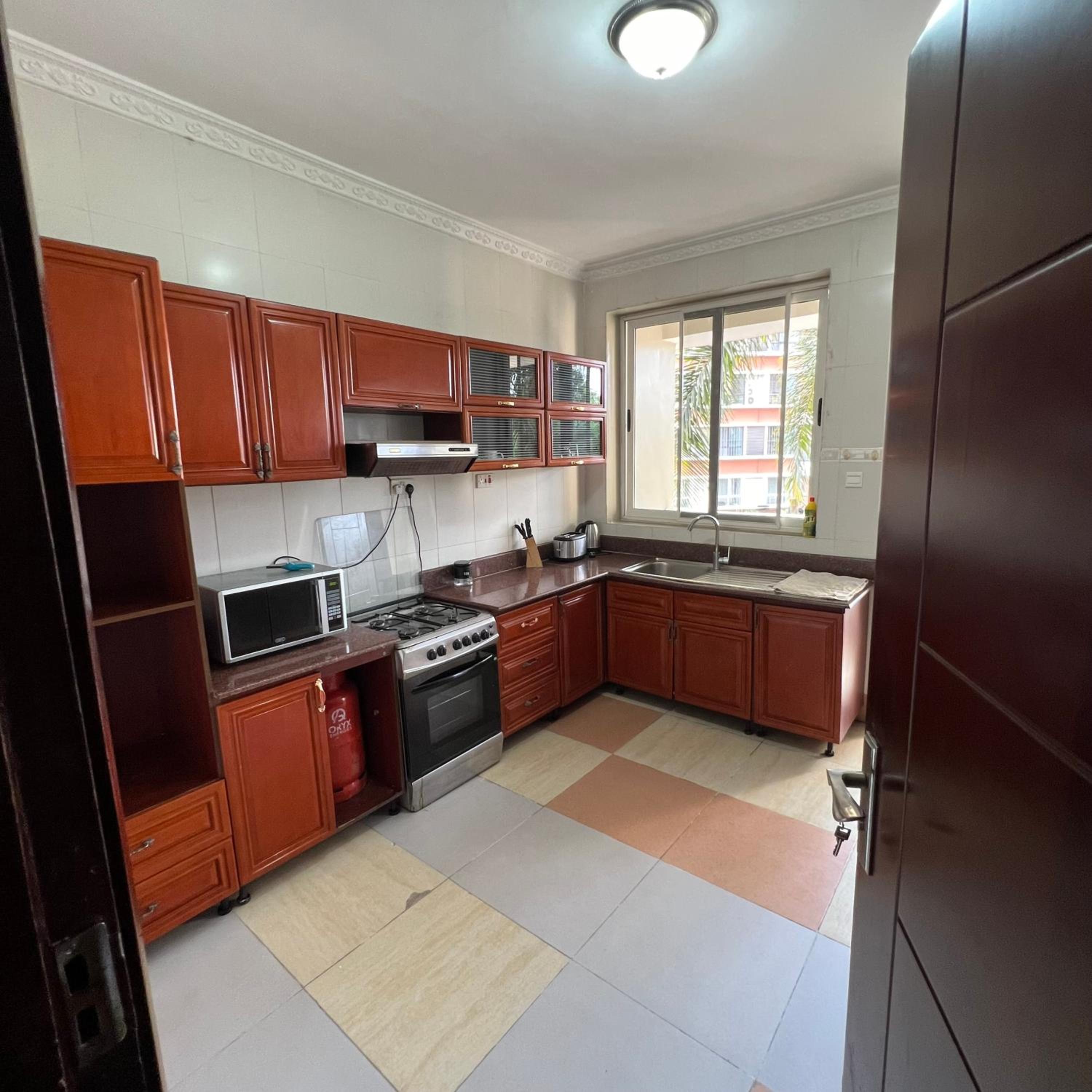 Spacious 3BR Family-Friendly Retreat With Pool & Gym Near Beach view 5