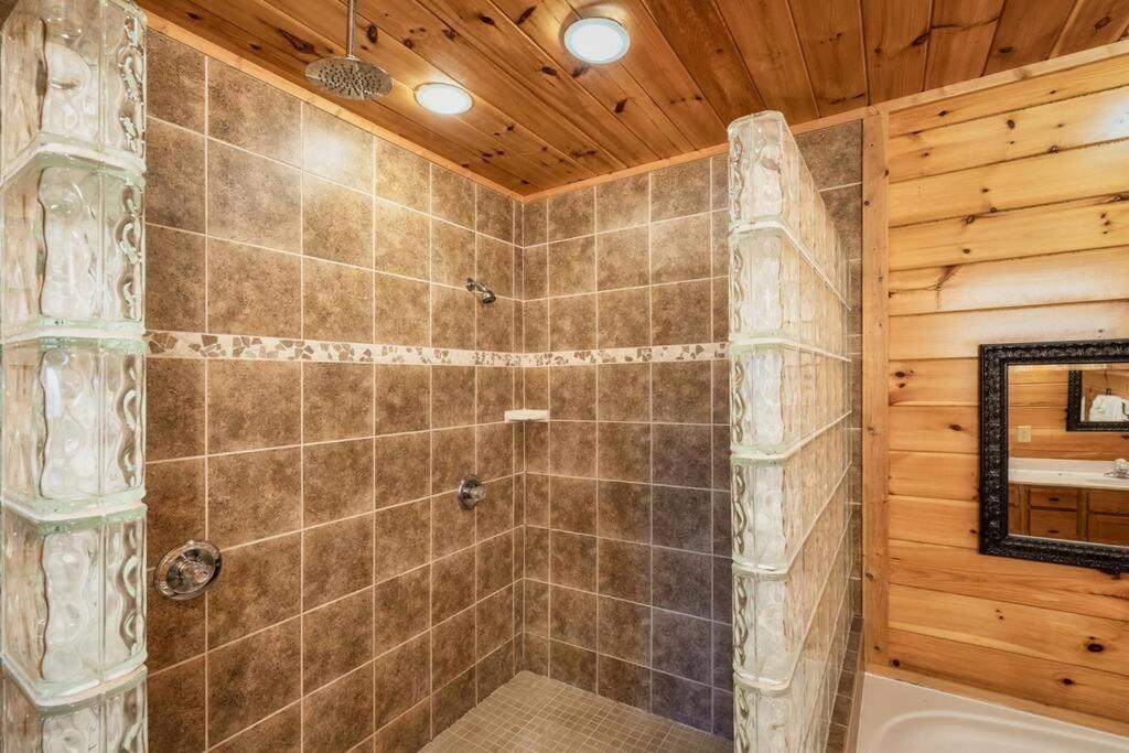 Cozy cabin, crackling fire, and hot tub magic! view 5