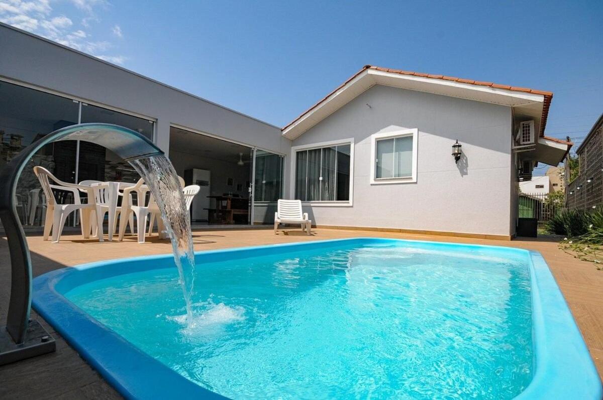 12 hóspedes - PISCINA tratamento com água salgada - Cozinha GOURMET - 4 QUARTOS - 3 BANHEIROS - GARAGEM - ESCRITORIO - 2,1 km do Cataratas JL Shopping