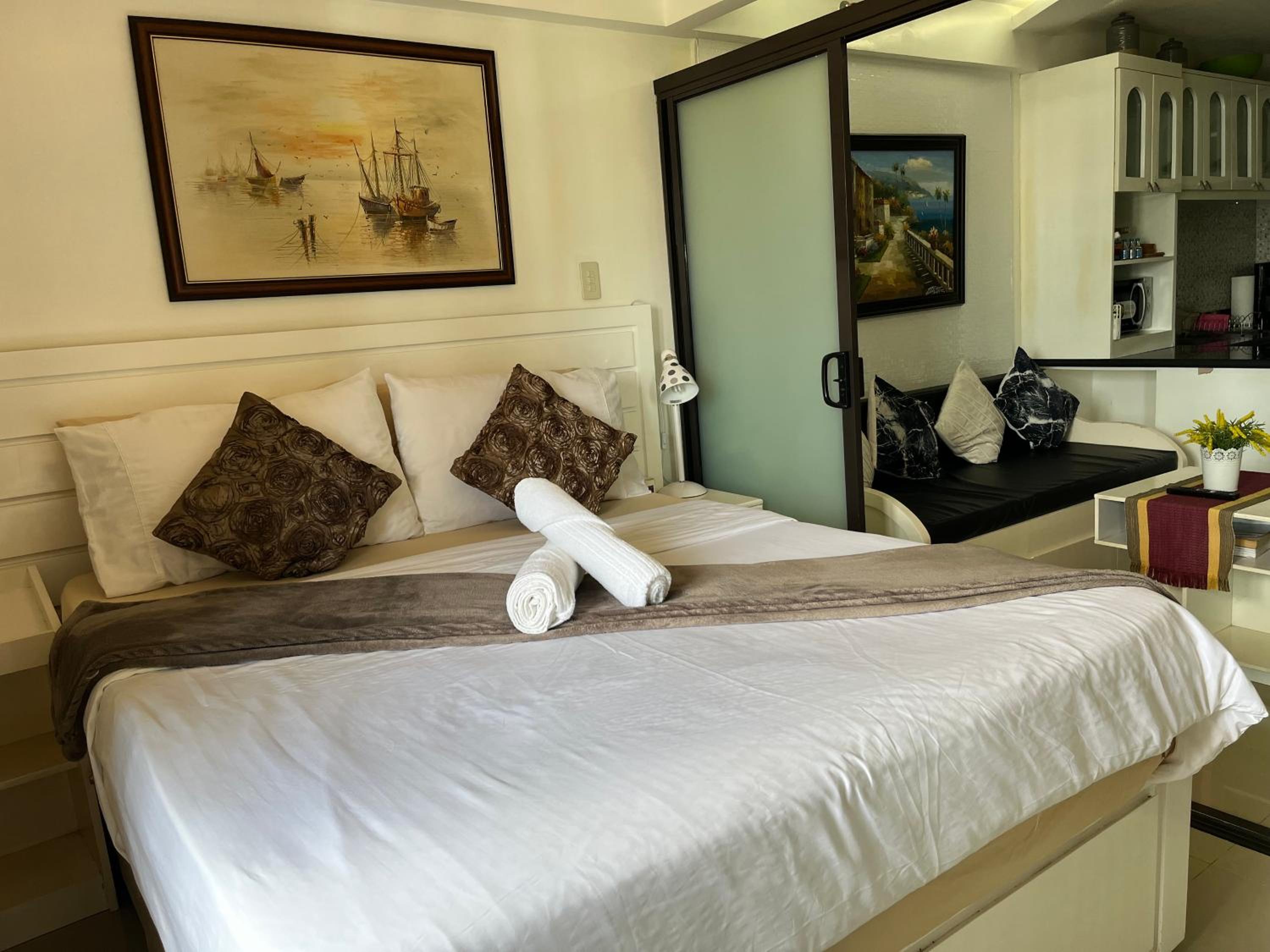1 Bedroom unit with balcony and facing amenities and just beside SM Ecoland view 4
