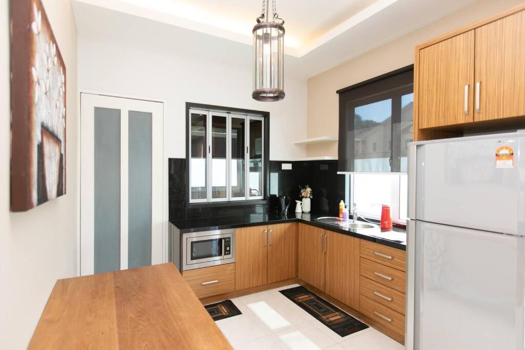 BalikPulau Cozy Home 4BR w BBQ photo 5