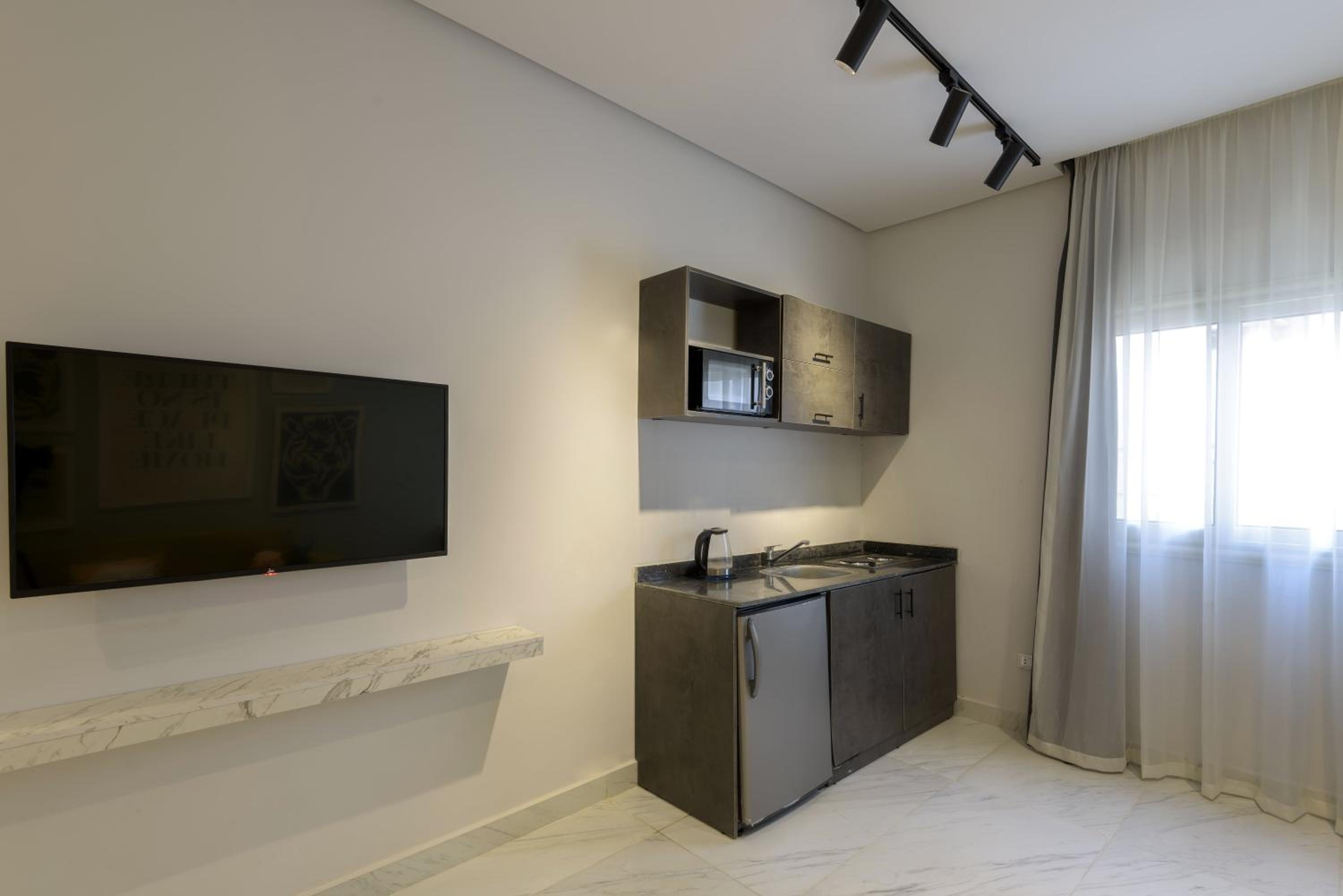 Travelholic 90 Residence