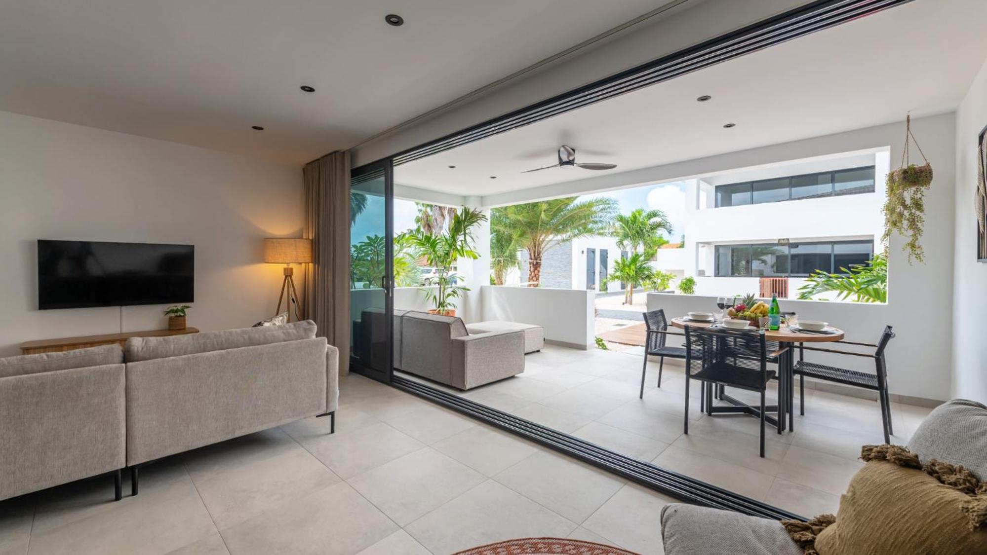 Palm Suite - Newly constructed poolside apartment just minutes from the beach