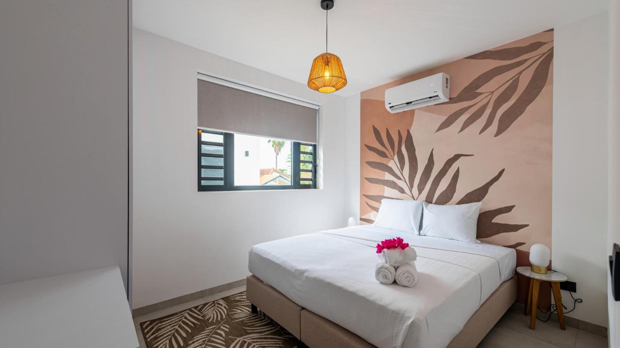 Palm Suite - Newly constructed poolside apartment just minutes from the beach
