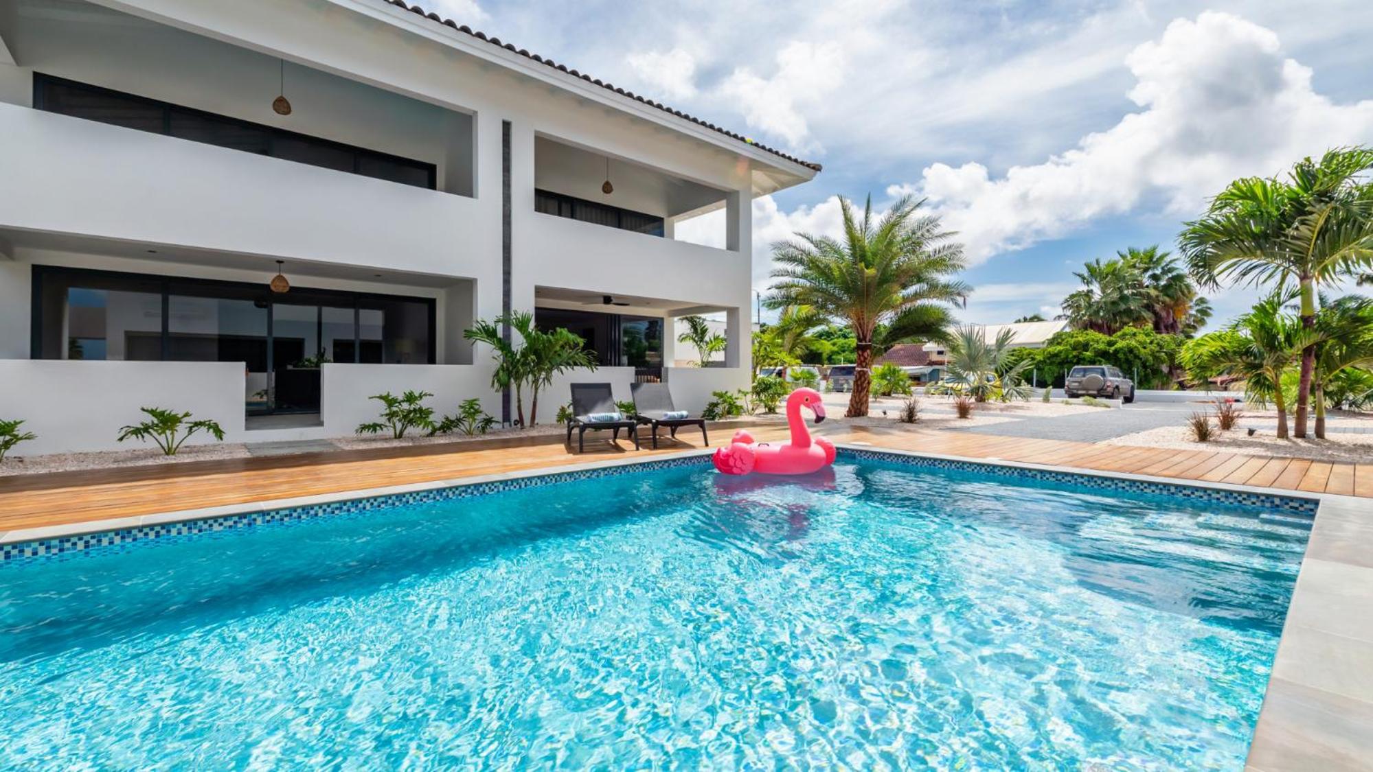 Palm Suite - Newly constructed poolside apartment just minutes from the beach