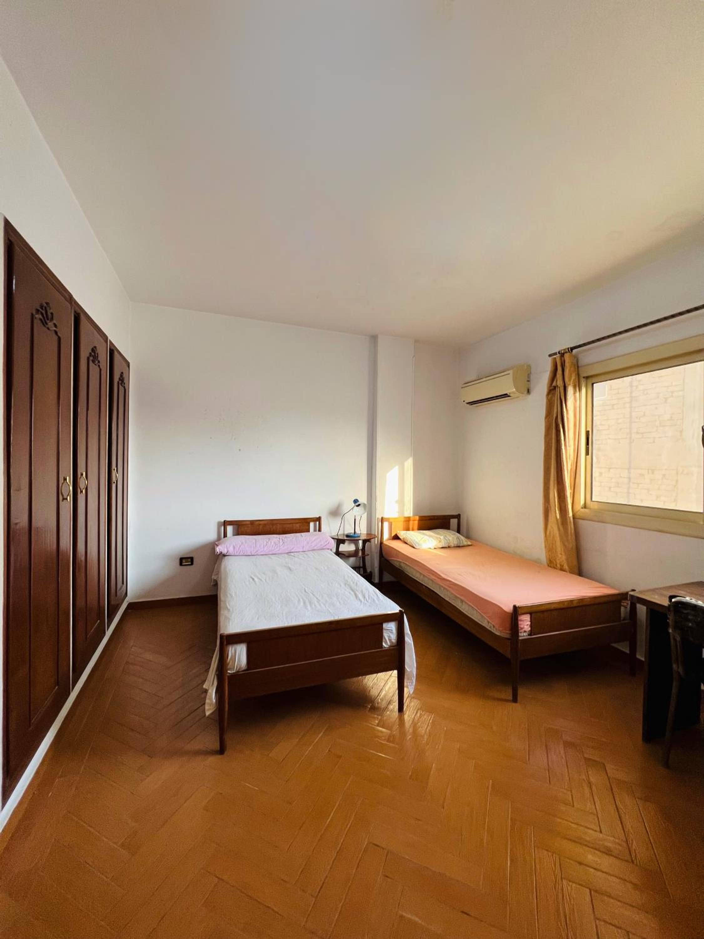 Sunny central room besides AUC downtown