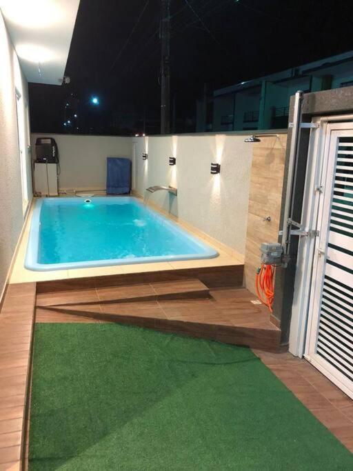 2 suítes ar piscina ar cond.