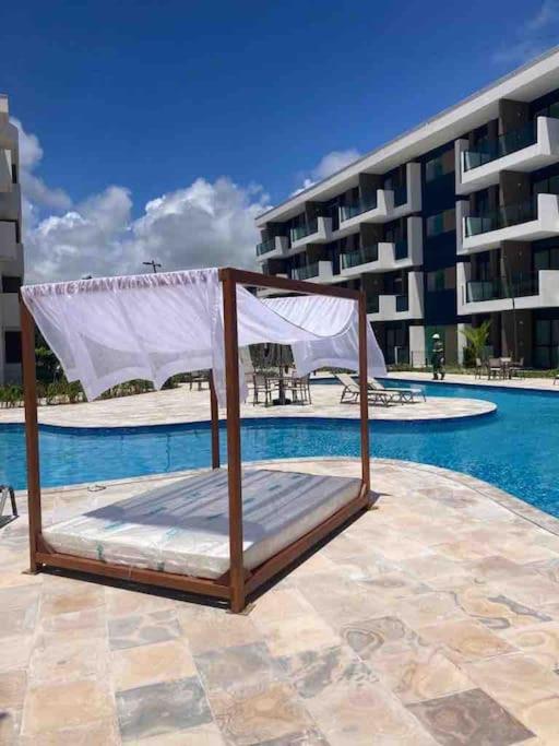 Resort em Porto de Galinhas- Flat Térreo Frente Piscinas- Muro Alto-B18