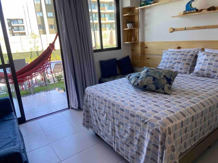 Resort em Porto de Galinhas- Flat Térreo Frente Piscinas- Muro Alto-B18