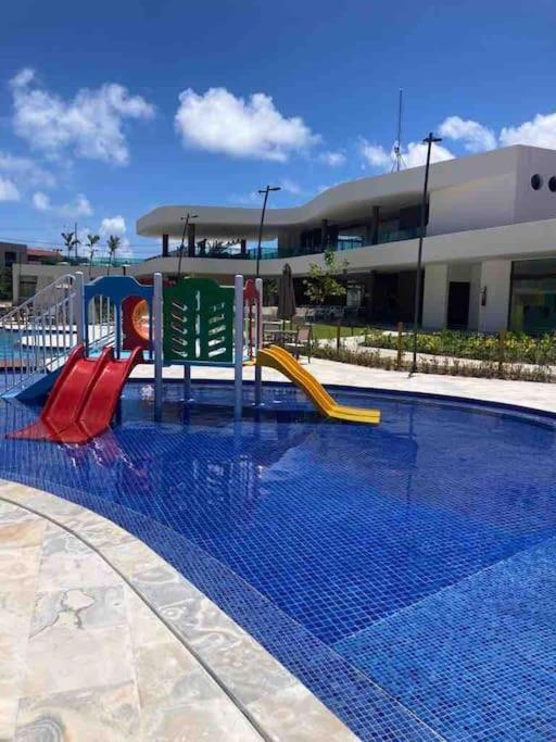 Resort em Porto de Galinhas- Flat Térreo Frente Piscinas- Muro Alto-B18