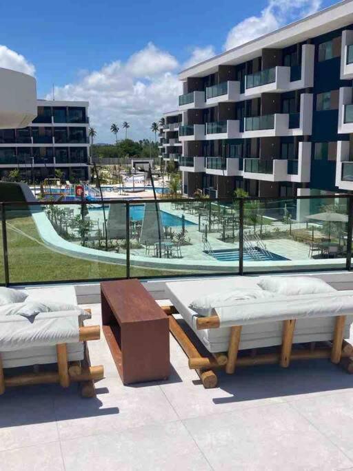 Resort em Porto de Galinhas- Flat Térreo Frente Piscinas- Muro Alto-B18