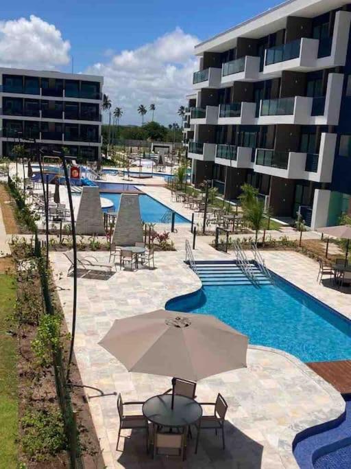 Resort em Porto de Galinhas- Flat Térreo Frente Piscinas- Muro Alto-B18