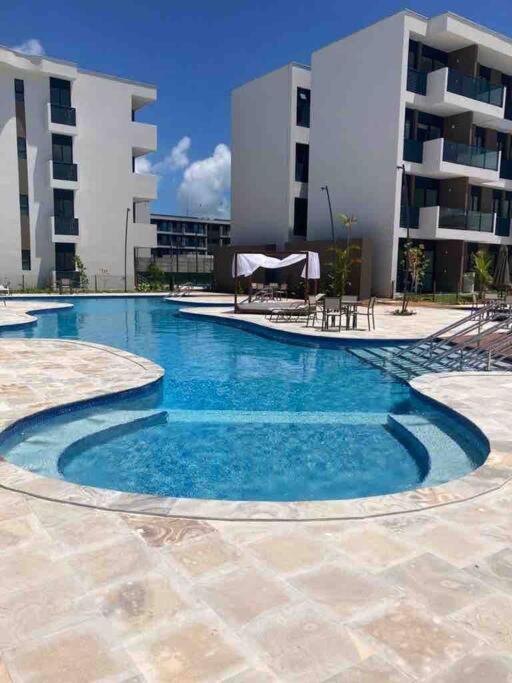 Resort em Porto de Galinhas- Flat Térreo Frente Piscinas- Muro Alto-B18