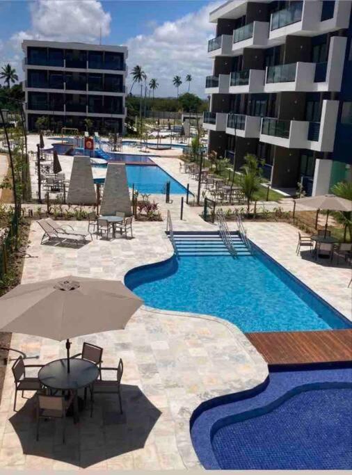 Resort em Porto de Galinhas- Flat Térreo Frente Piscinas- Muro Alto-B18