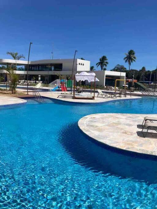 Resort em Porto de Galinhas- Flat Térreo Frente Piscinas- Muro Alto-B18