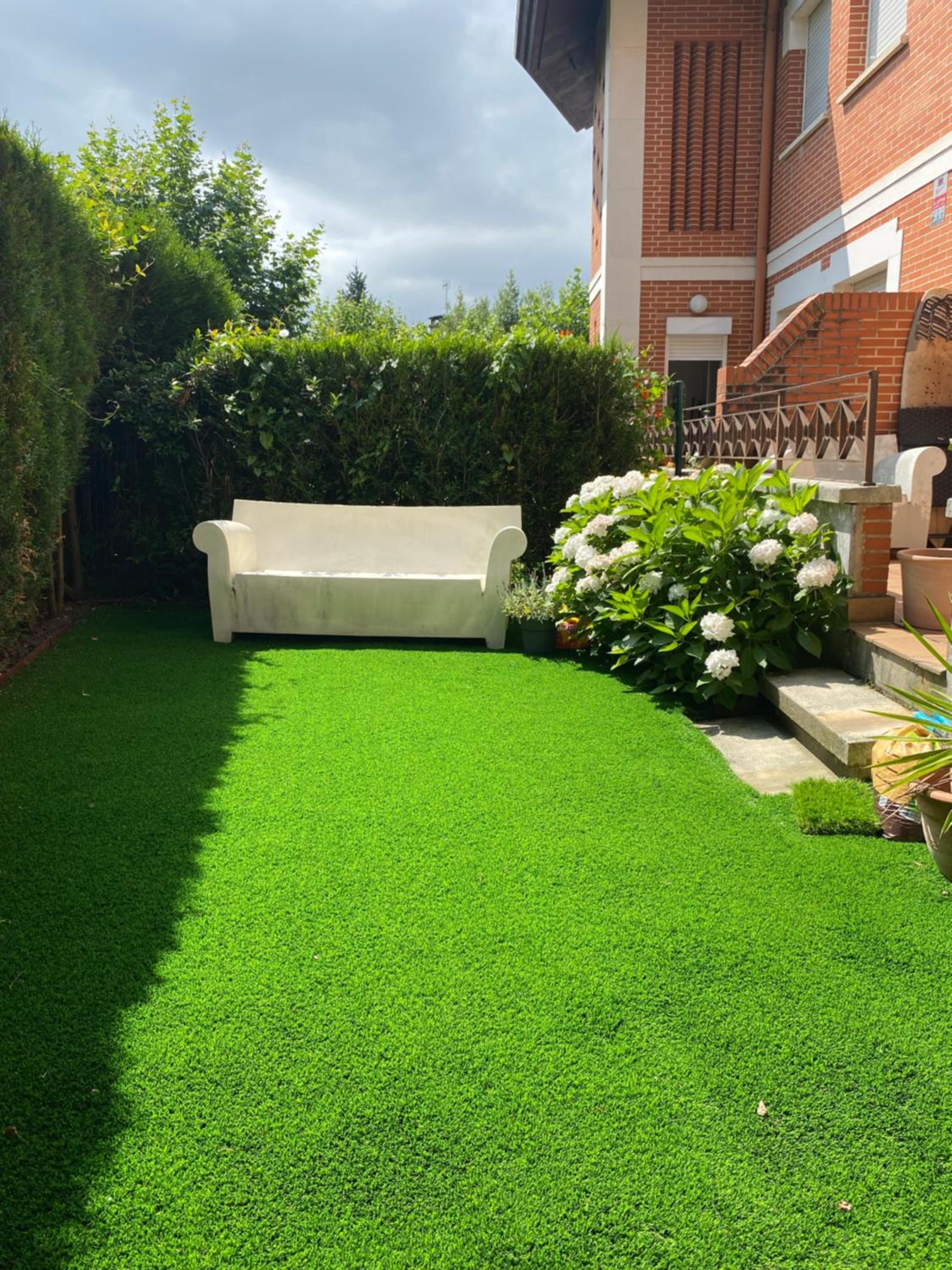 Apartamento con Jardín