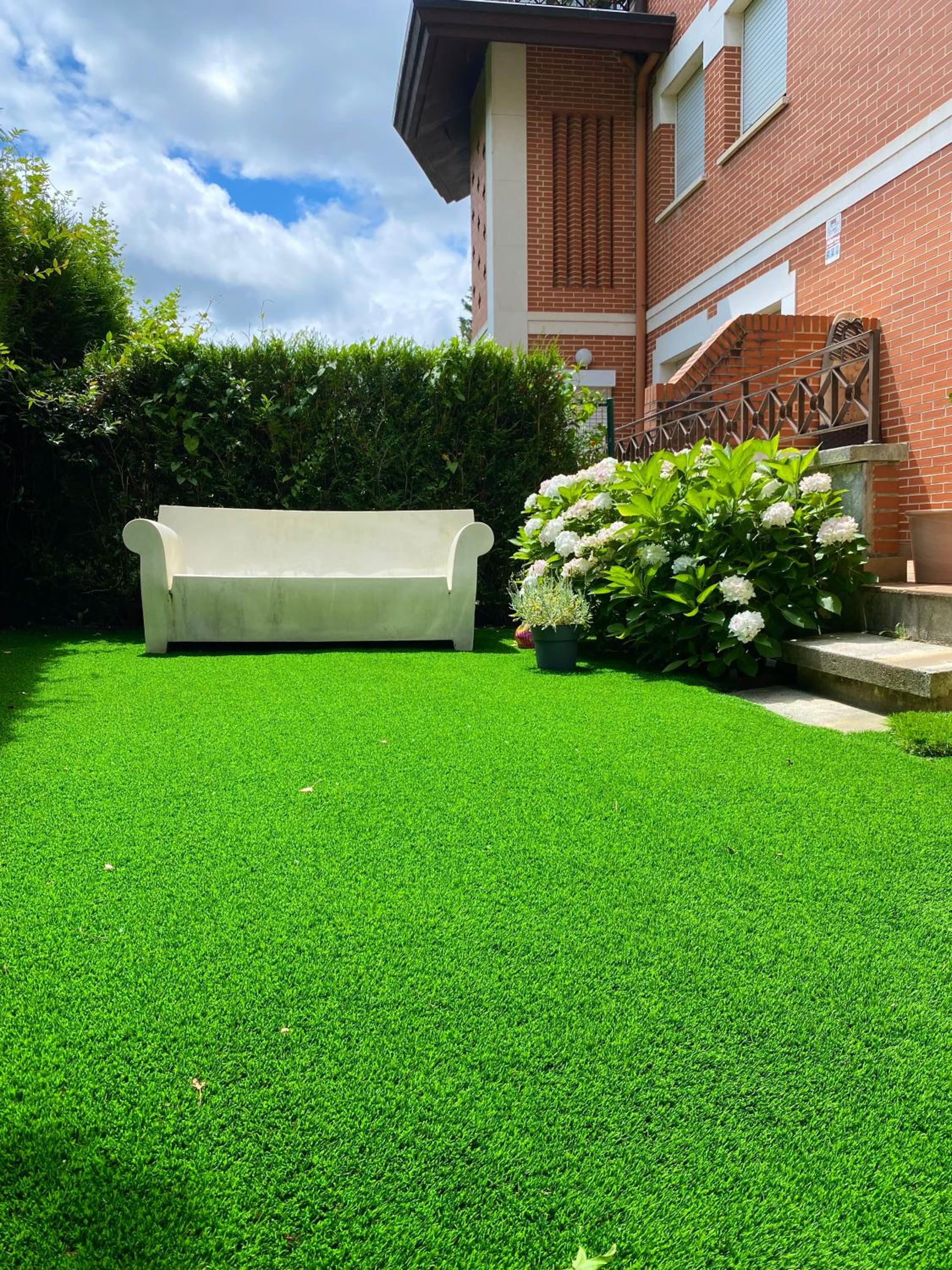 Apartamento con Jardín