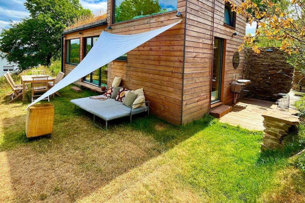 Tinyhouse Minimalus Panorama Schlafloft im Grünen
