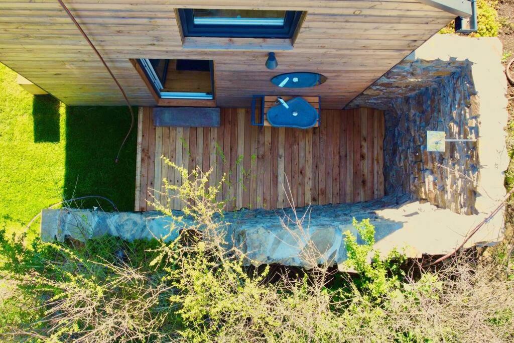 Tinyhouse Minimalus Panorama Schlafloft im Grünen