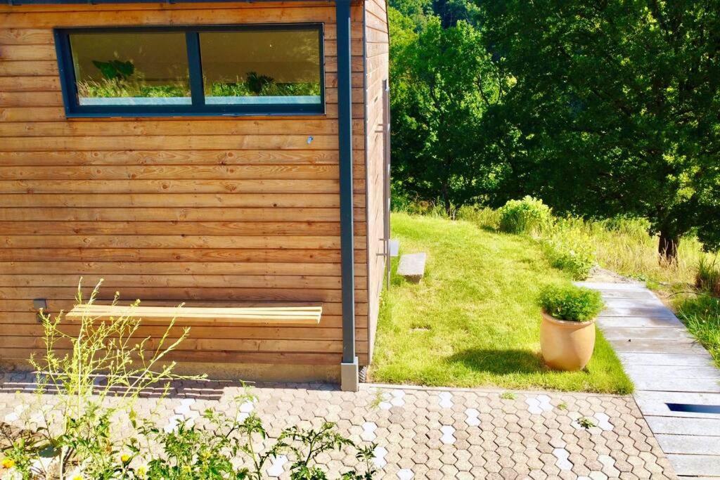 Tinyhouse Minimalus Panorama Schlafloft im Grünen