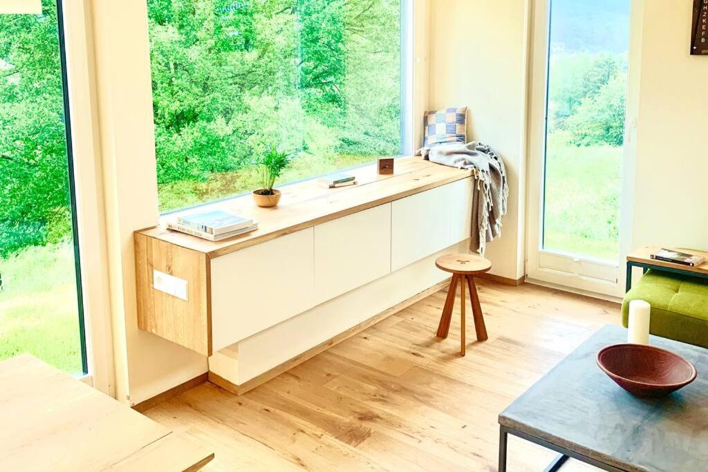 Tinyhouse Minimalus Panorama Schlafloft im Grünen