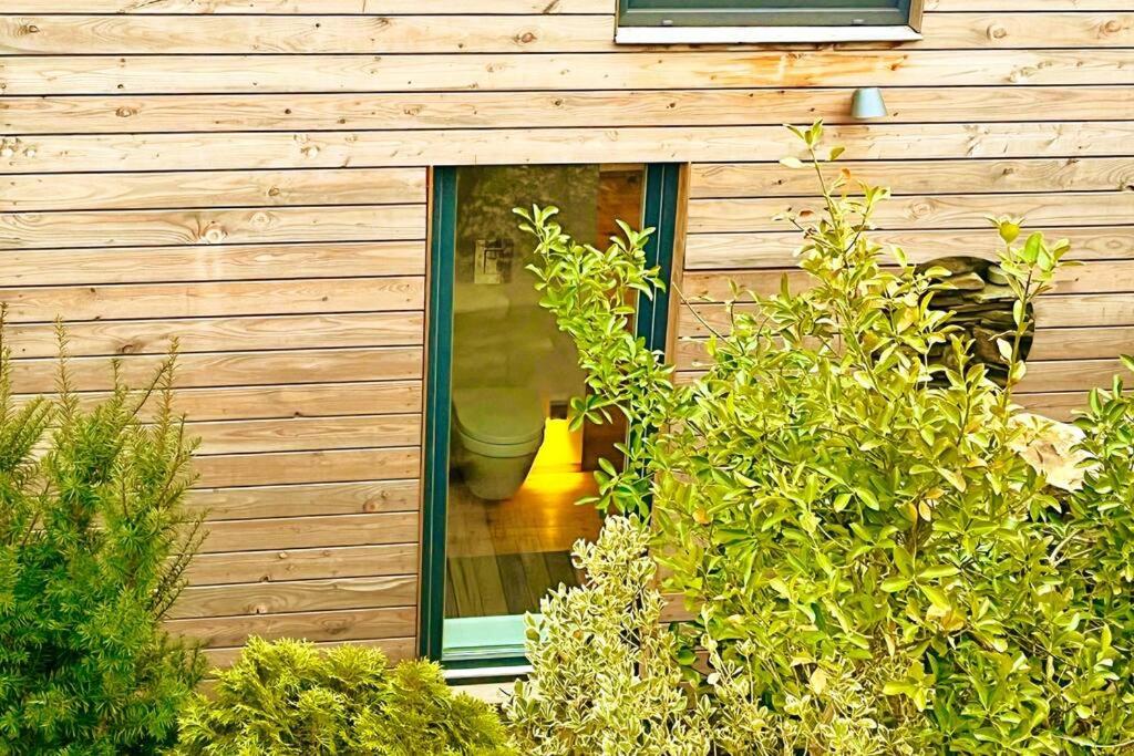 Tinyhouse Minimalus Panorama Schlafloft im Grünen