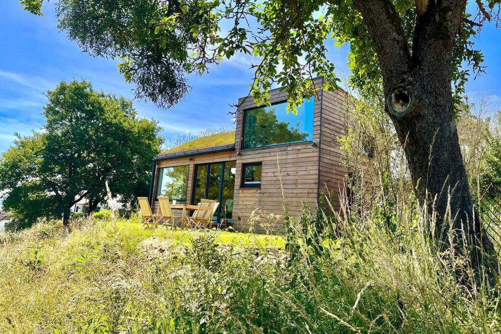 Tinyhouse Minimalus Panorama Schlafloft im Grünen