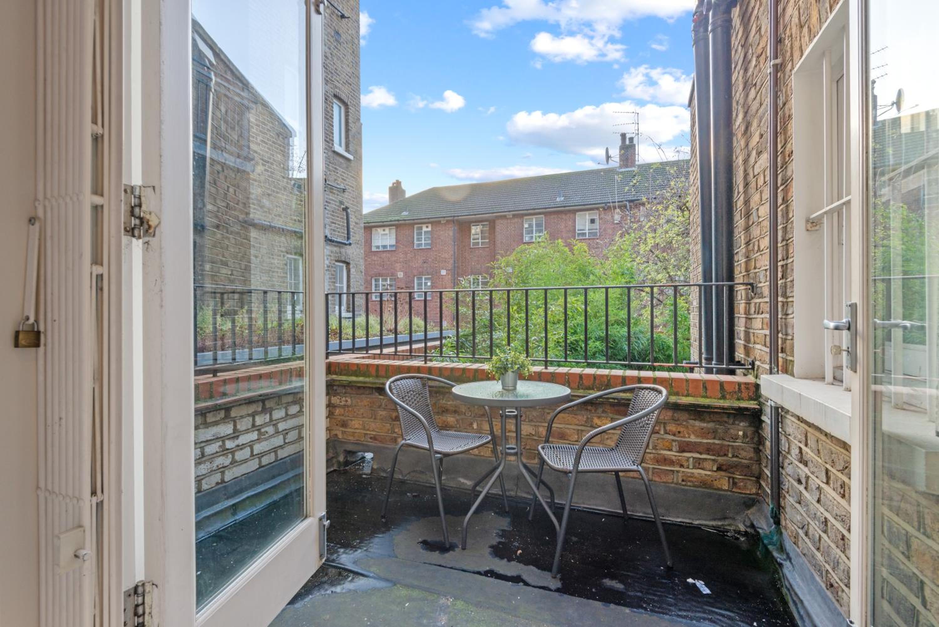 Notting Hill: Stylish 1BR with Terrace - Suite Inn
