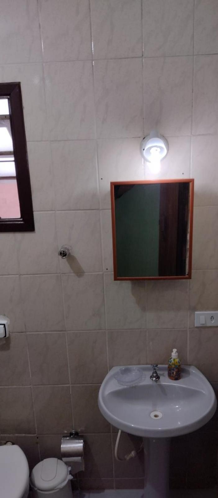 Casa próximo a praia com churrasqueira e ar condicionado!