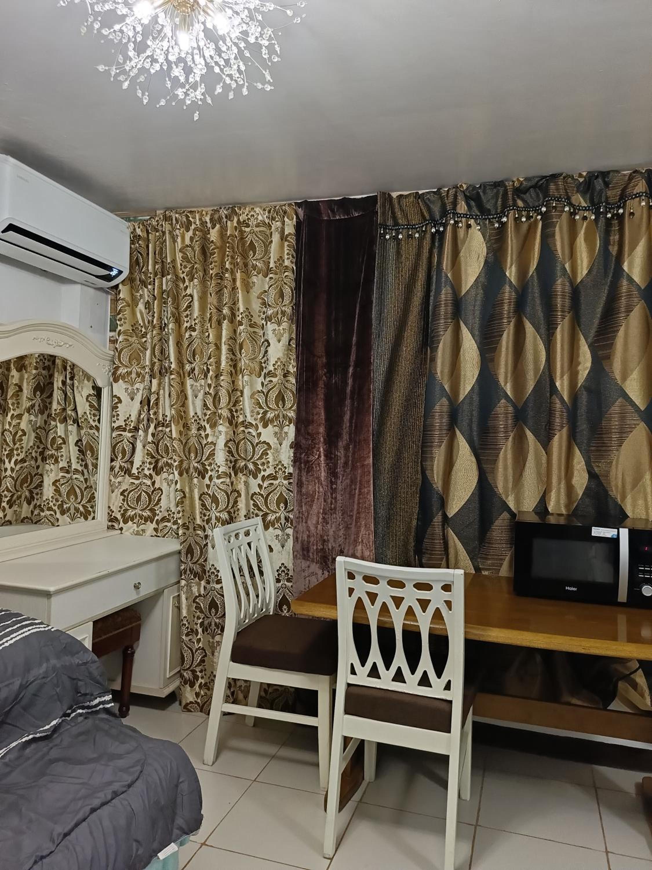 Cozy condo with KING-size bed, 70inch Samsung SmartTV , in calm Urban Deca Homes Tipolo complex view 3