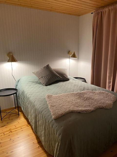 Lomanaamanka Naava-hirsimökki