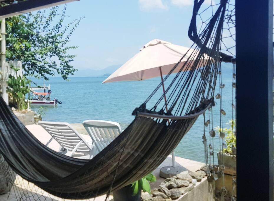 Casa na Ilha Jardim pé na areia