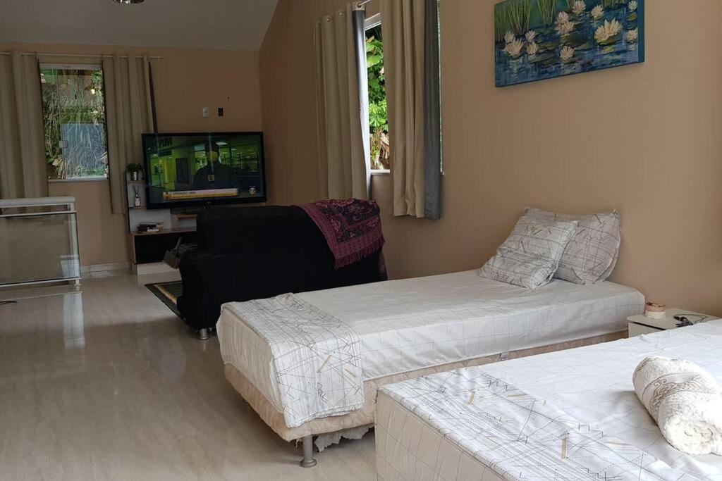 Casa na Ilha Jardim pé na areia