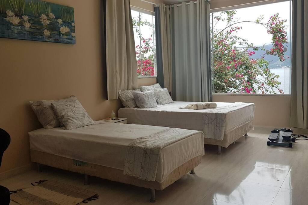Casa na Ilha Jardim pé na areia