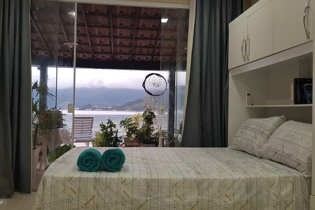 Casa na Ilha Jardim pé na areia