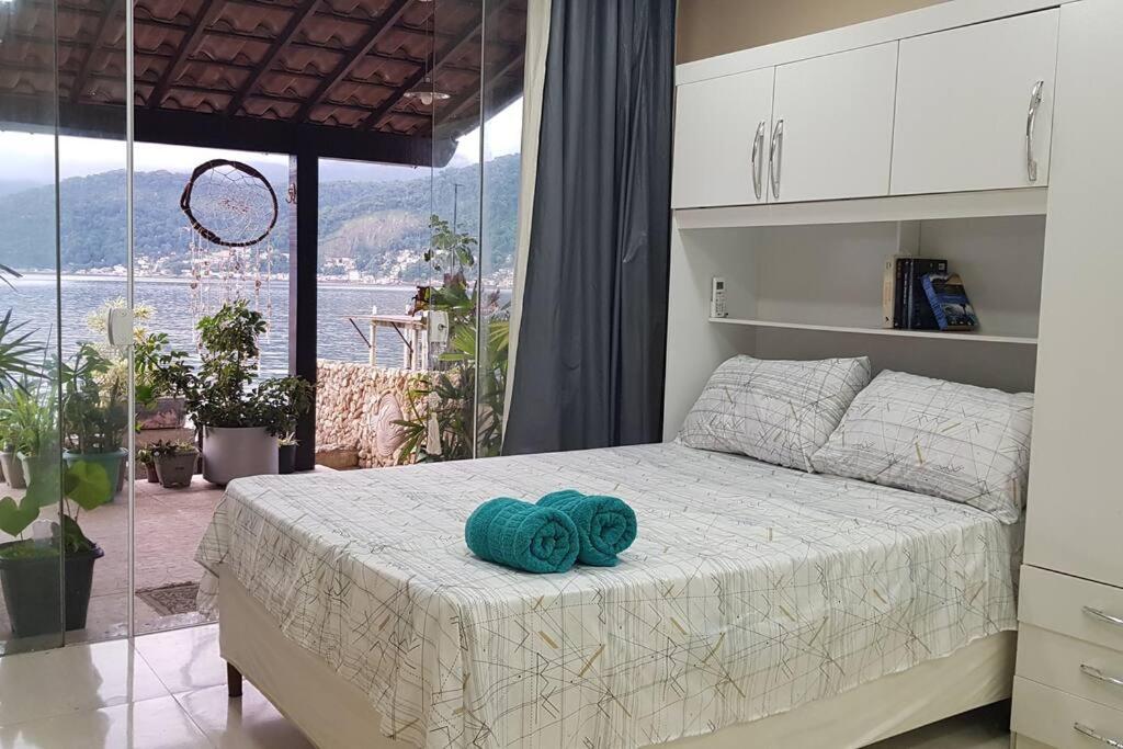 Casa na Ilha Jardim pé na areia