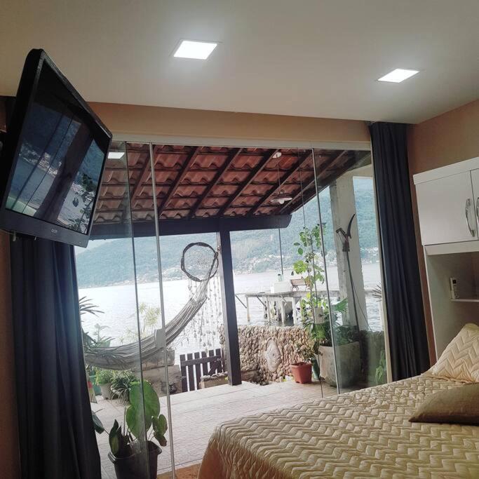 Casa na Ilha Jardim pé na areia
