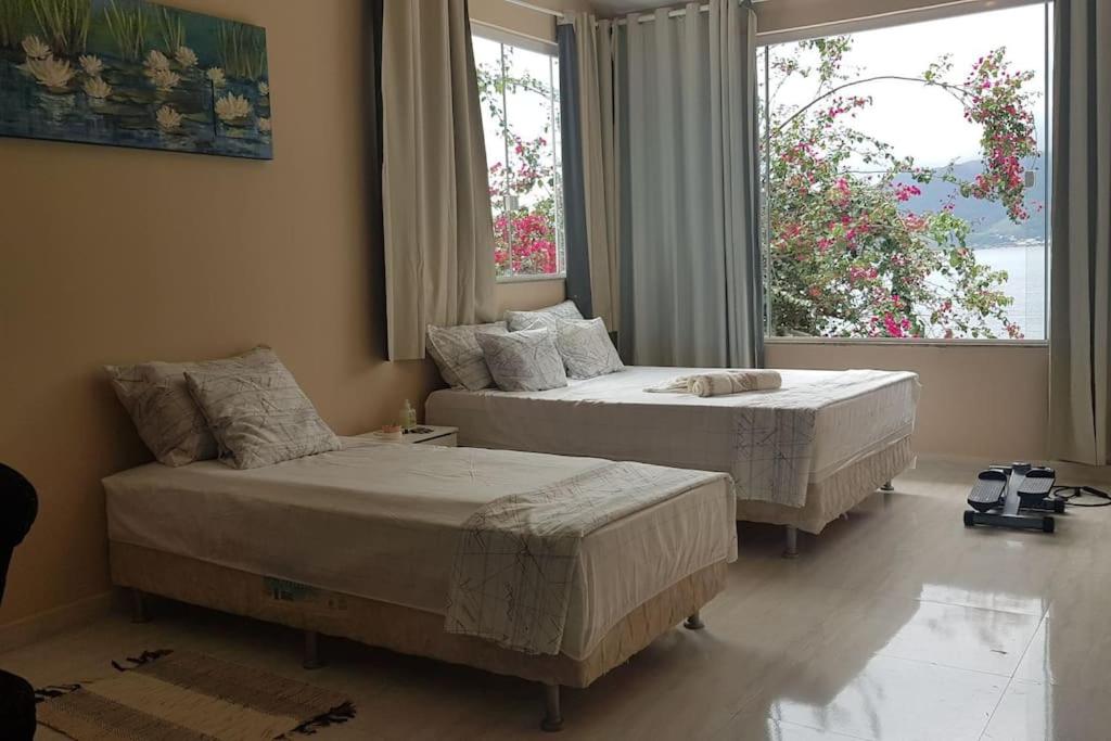 Casa na Ilha Jardim pé na areia