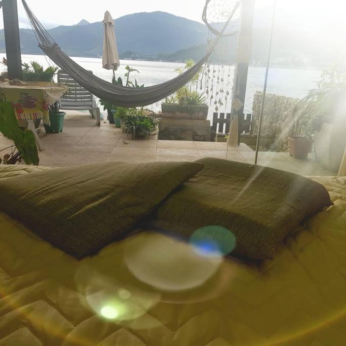 Casa na Ilha Jardim pé na areia