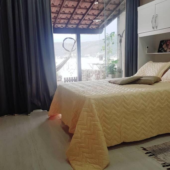 Casa na Ilha Jardim pé na areia