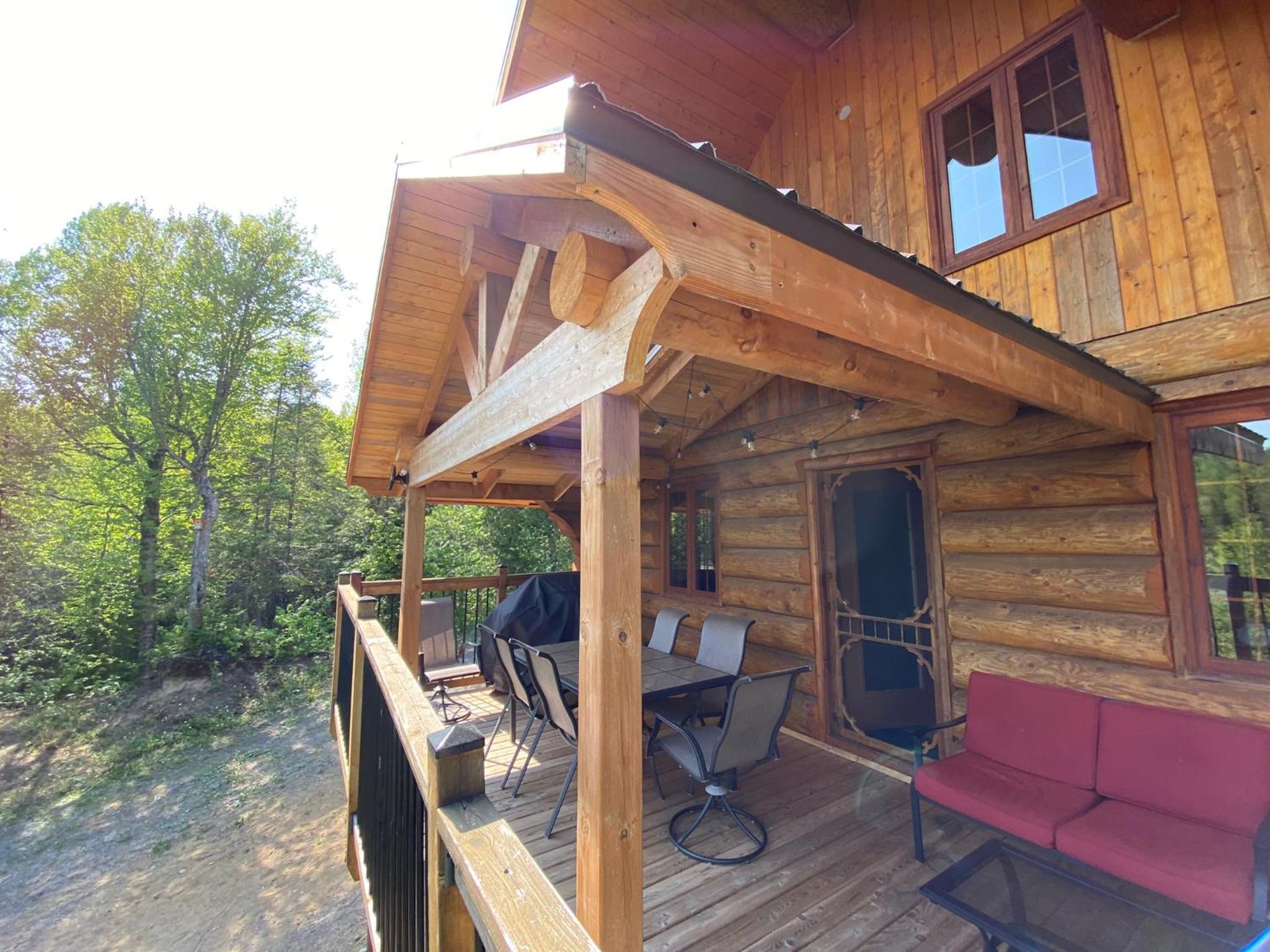 Chalet bois rond aux paysages uniques avec Spa !