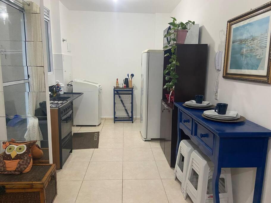 Palhoça- apto com Jardim para churrasco -Bromélias